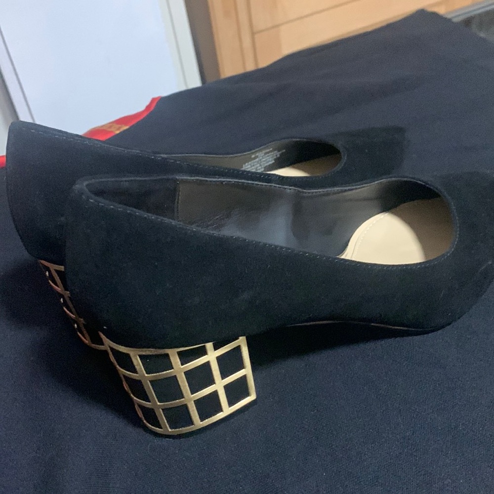 Brian Atwood black suede and gold block heel.